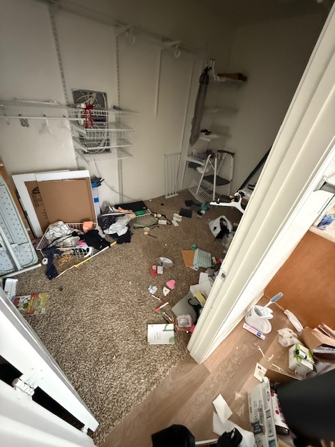 Black suitcase and storage drawers